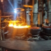 A glass bowl is being polished