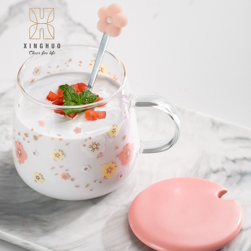 Top view of a floral print glass mug for holding yogurt.